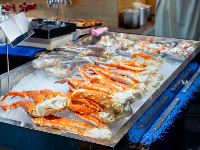 Crab displayed on ice at a Japanese food market