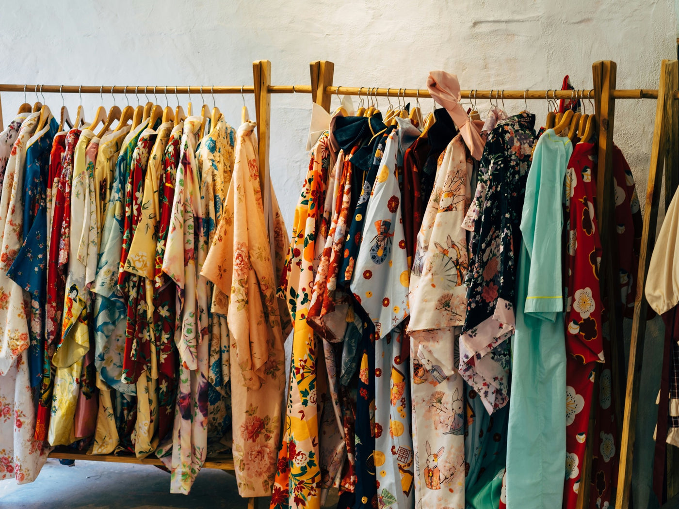 Rows of patterned kimono and yukata ready for guests to choose