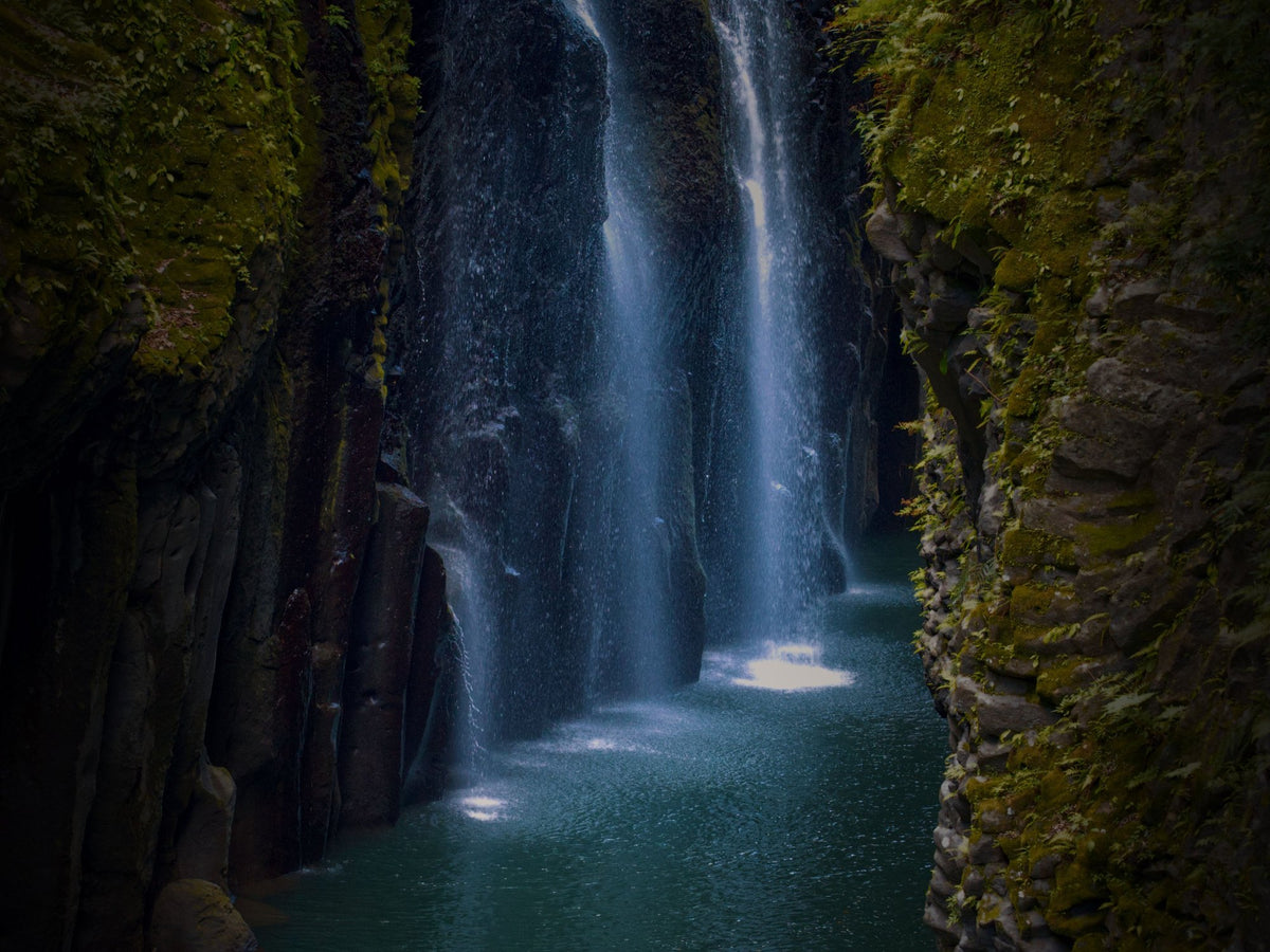 Boat beneath the waterfalls of Takachiho Gorge